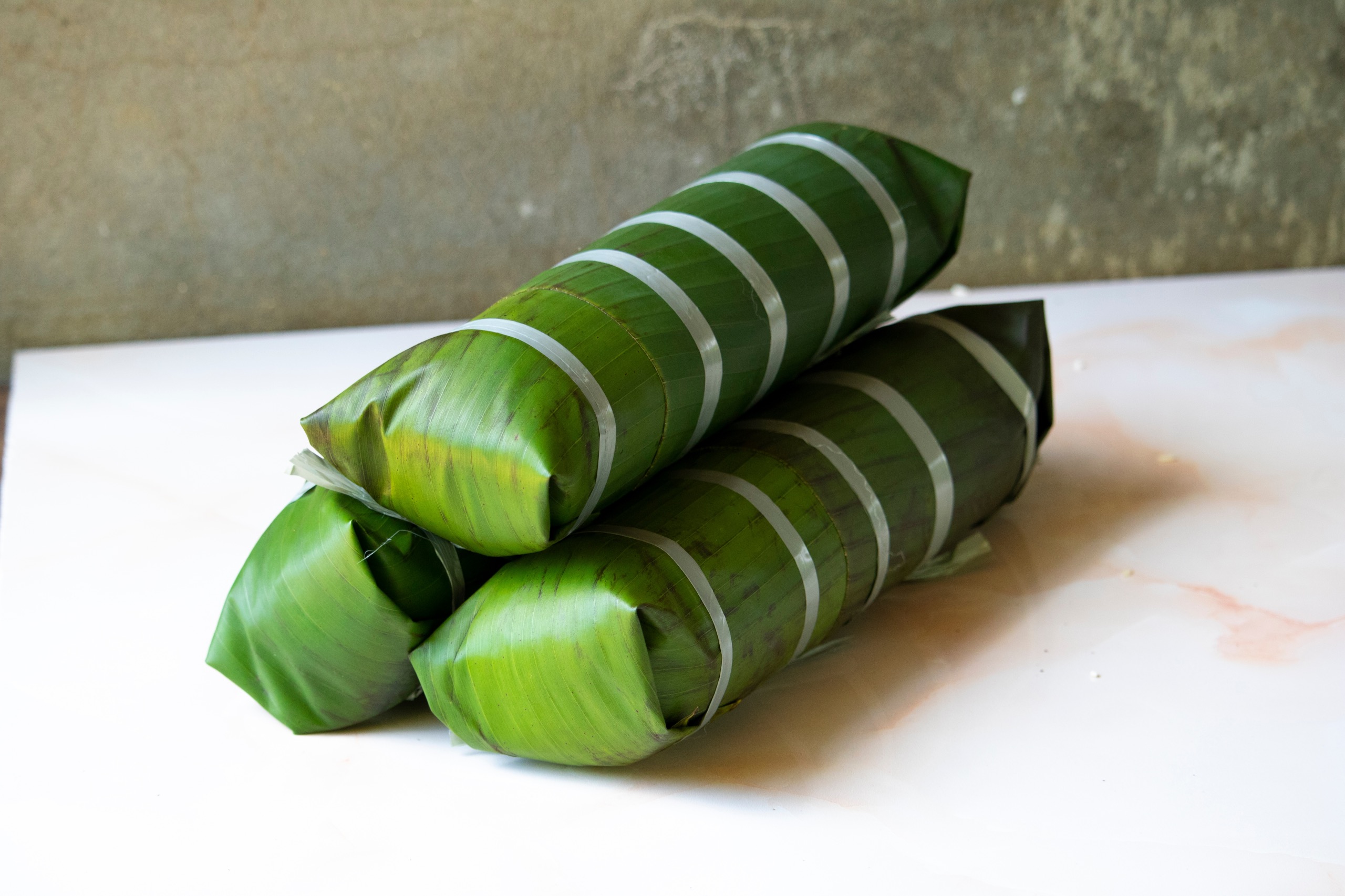 La recette authentique du num ansom chek, le gâteau de riz cambodgien à la banane